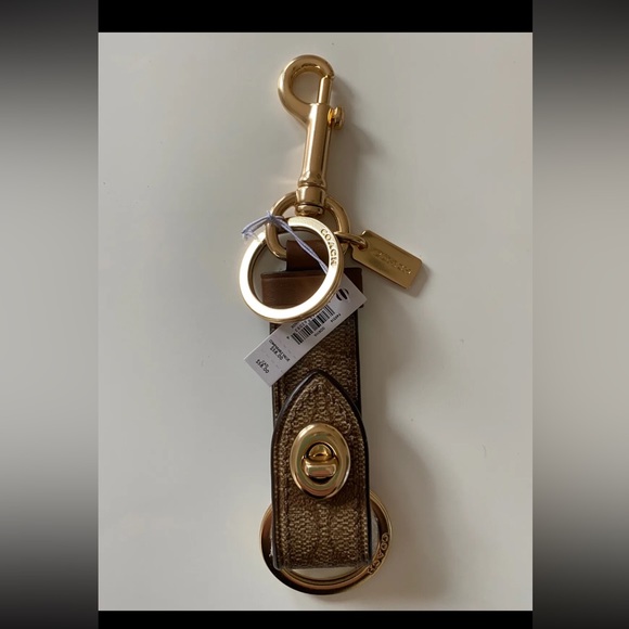 NWT Coach Signature Trigger Snap Bag Charm/Key Ring F49314 Khaki/Gold - Picture 1 of 8